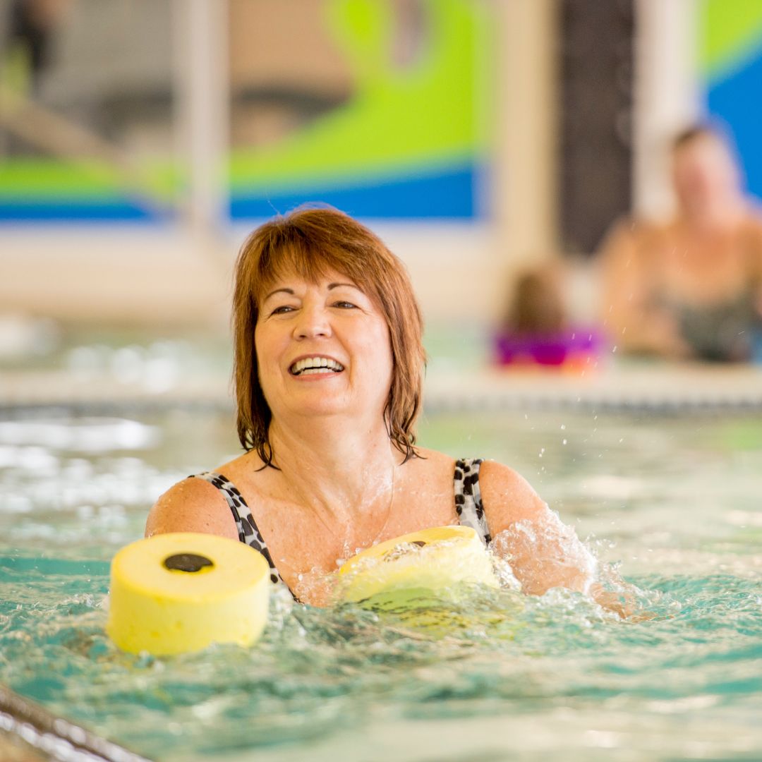 Lady performing hydrotherapy exercises