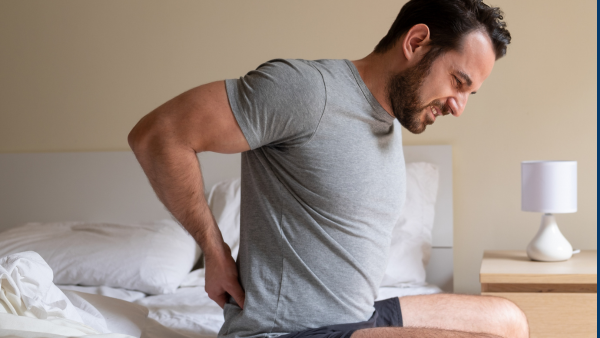 Person feeling sore and stiff because of prolonged rest